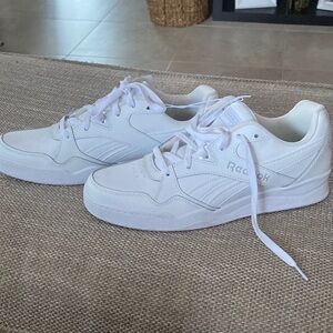Men’s brand new white Reebok’s .